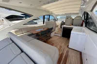 Luxurious interior of 2020 Fairline Targa 48 Open yacht with elegant seating and wooden flooring.