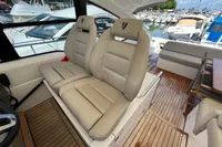 Luxury seating on 2020 Fairline Targa 48 Open yacht, featuring elegant interior design.