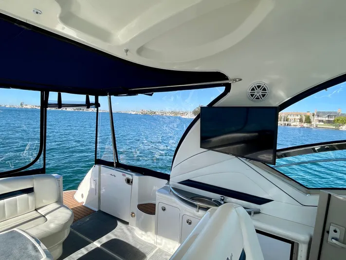 Deja Blue Yacht Photos Pics Interior view of 2005 Sea Ray 390 Sundancer yacht with ocean backdrop.