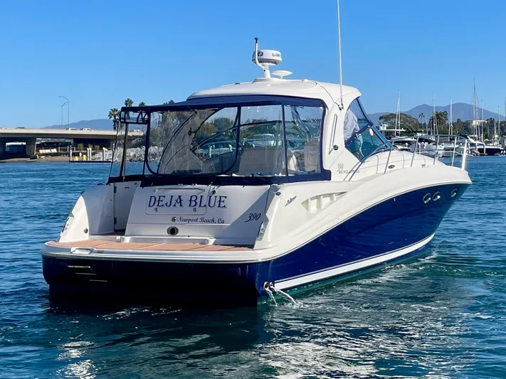 Deja Blue Yacht Photos Pics 2005 Sea Ray 390 Sundancer boat named "Deja Blue" on the water.