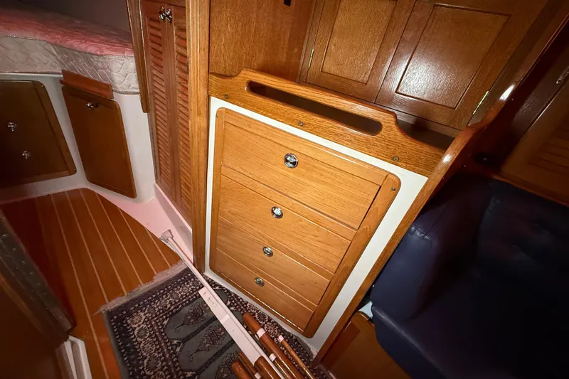 Finisterre Yacht Photos Pics Interior of 2006 Catalina 36 MkII sailboat with wooden cabinetry and cozy furnishings.