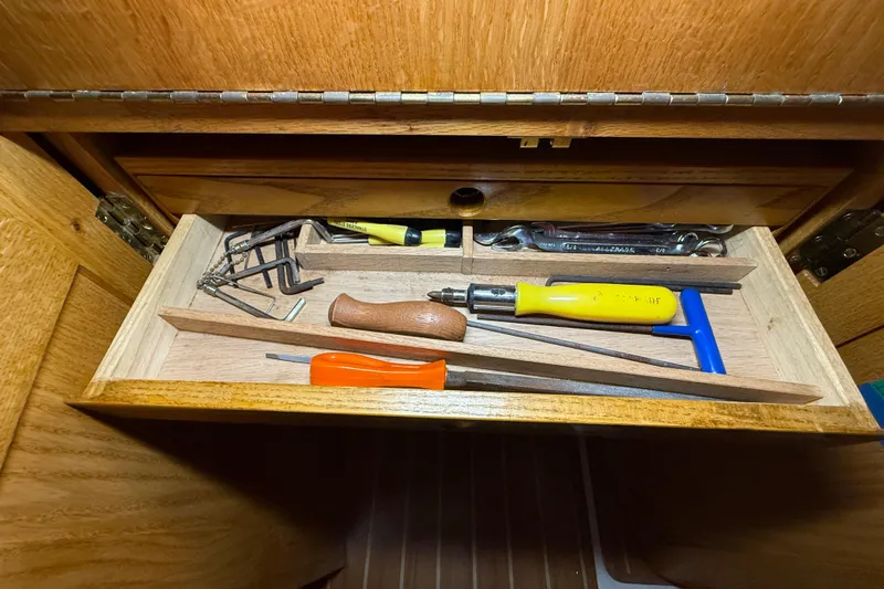 Finisterre Yacht Photos Pics Tool drawer in a 2006 Catalina 36 MkII sailboat, featuring various hand tools.