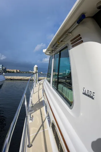 Vienna Yacht Photos Pics 2018 Sabre 48 Salon Express yacht docked at marina under cloudy sky.