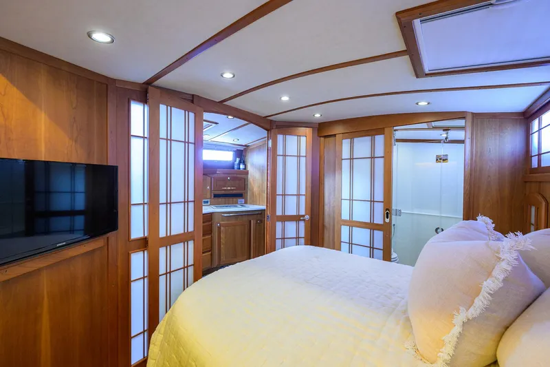 Vienna Yacht Photos Pics Luxurious interior of 2018 Sabre 48 Salon Express yacht with wood paneling and modern amenities.