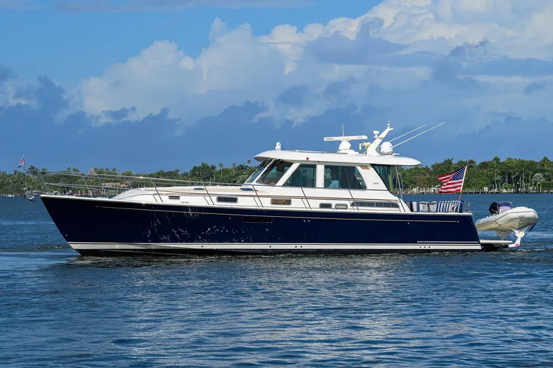 Vienna Yacht Photos Pics 2018 Sabre 48 Salon Express yacht cruising on a sunny day with American flag.