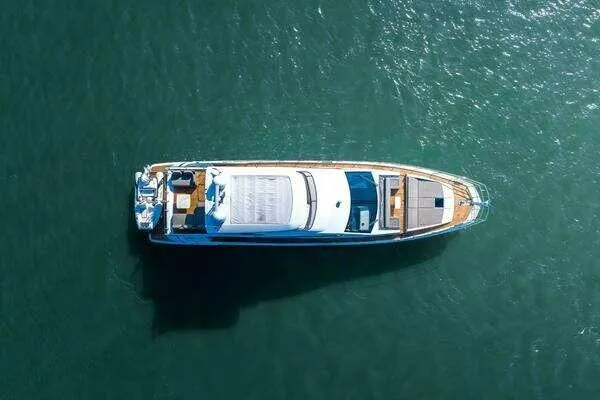  Yacht Photos Pics Overhead view of 2020 Azimut 66 yacht on calm water.