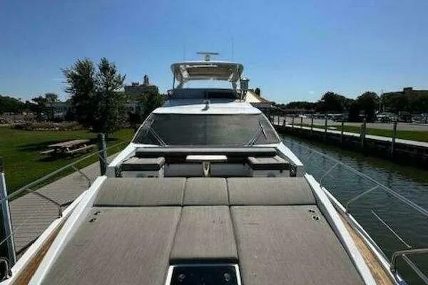  Yacht Photos Pics 2020 Azimut 66 yacht docked, featuring spacious sunbathing area and sleek design.