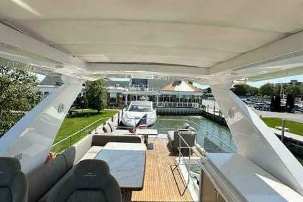  Yacht Photos Pics Luxurious 2020 Azimut 66 yacht with spacious deck and elegant seating area.