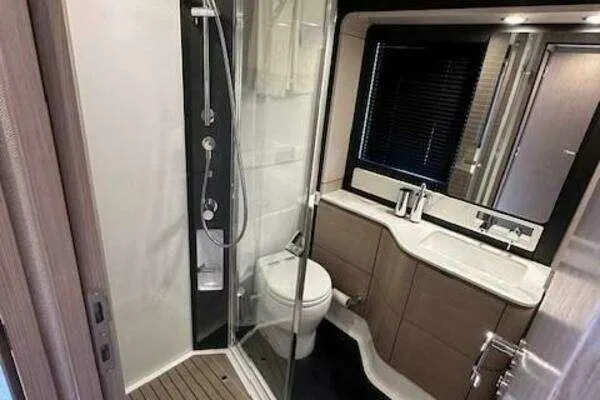  Yacht Photos Pics Luxurious bathroom in 2020 Azimut 66 yacht with modern fixtures and glass shower.