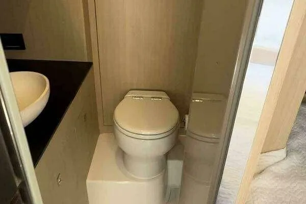  Yacht Photos Pics Bathroom interior of 2020 Azimut 66 yacht with modern fixtures.