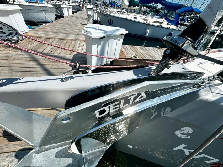  Yacht Photos Pics 2023 Beneteau Oceanis 34.1 yacht with Delta anchor at marina dock.