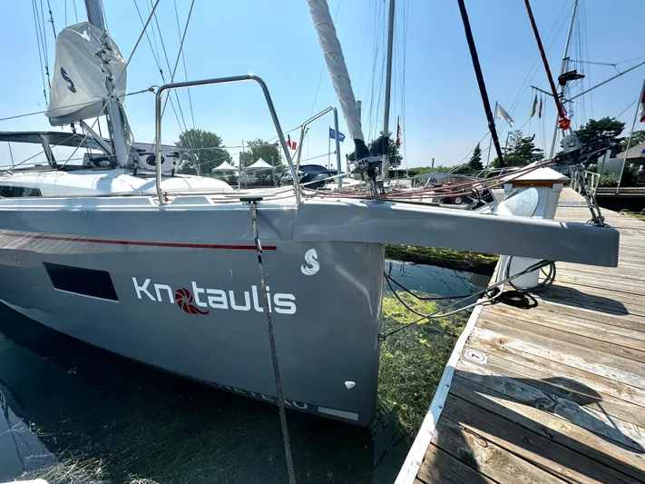  Yacht Photos Pics 2023 Beneteau Oceanis 34.1 sailboat docked, featuring sleek design and modern rigging.