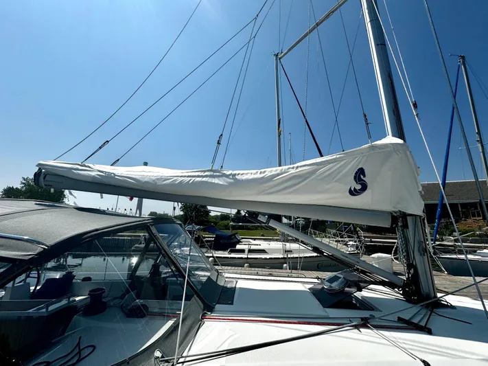  Yacht Photos Pics 2023 Beneteau Oceanis 34.1 sailboat docked, featuring sleek design and modern rigging.
