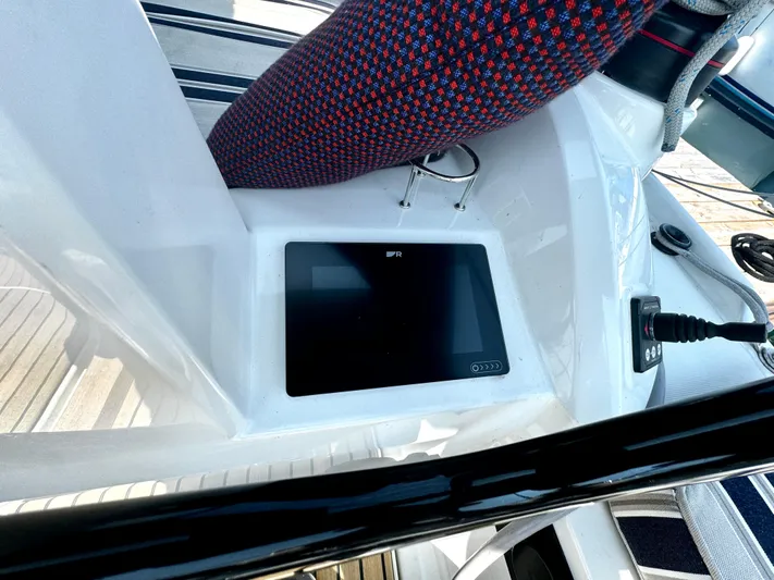  Yacht Photos Pics 2023 Beneteau Oceanis 34.1 cockpit with navigation display and control panel.