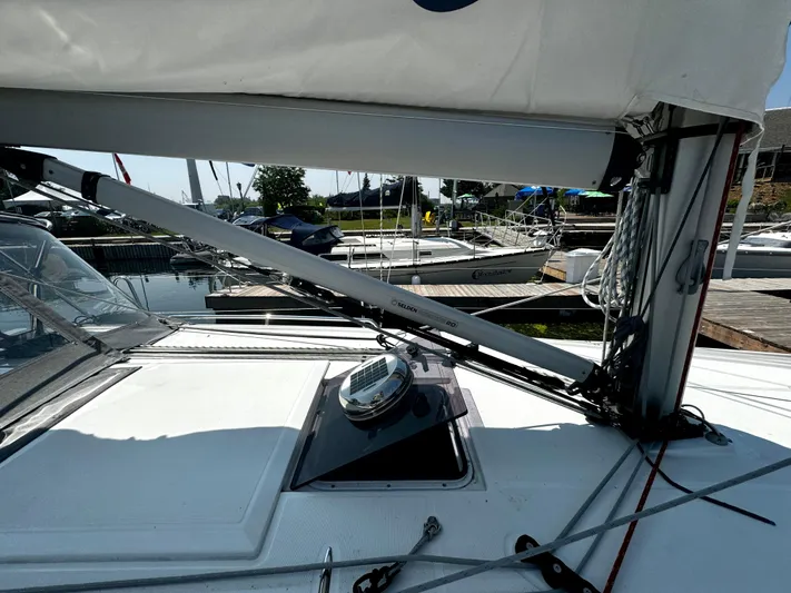  Yacht Photos Pics 2023 Beneteau Oceanis 34.1 sailboat deck with rigging and hatch detail.