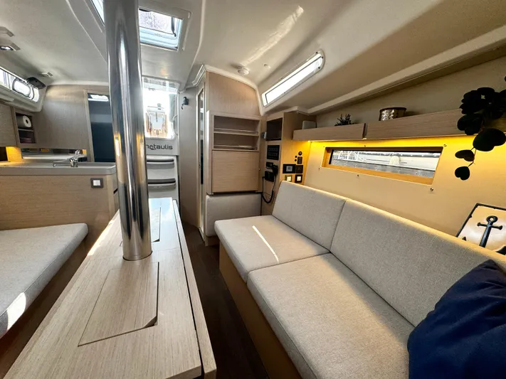  Yacht Photos Pics 2023 Beneteau Oceanis 34.1 interior with modern design, featuring cozy seating and natural light.