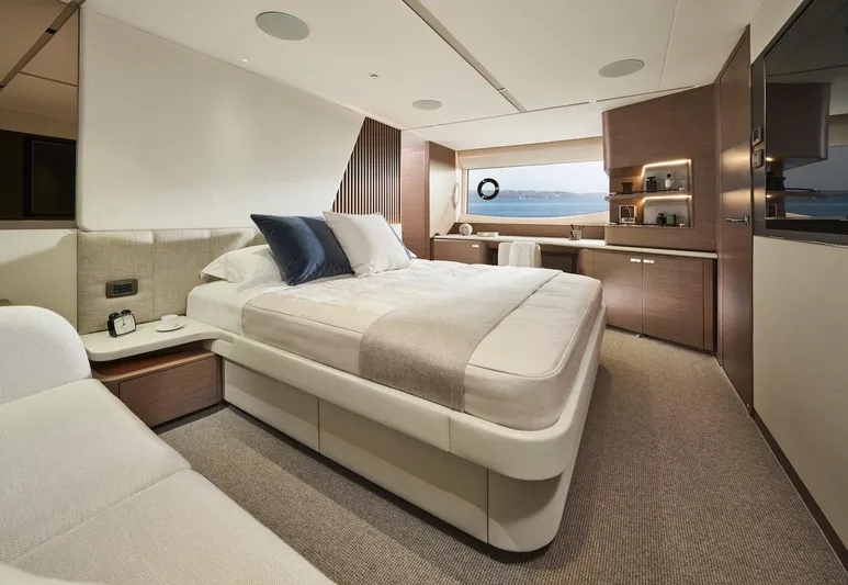  Yacht Photos Pics Luxurious bedroom interior of 2025 Princess Y72 Motor Yacht with ocean view.