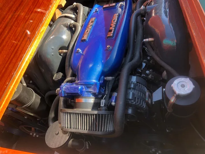 Arrivederci Yacht Photos Pics 2018 Riva Reets Replica Super Aquarama engine with blue Ilmor cover.