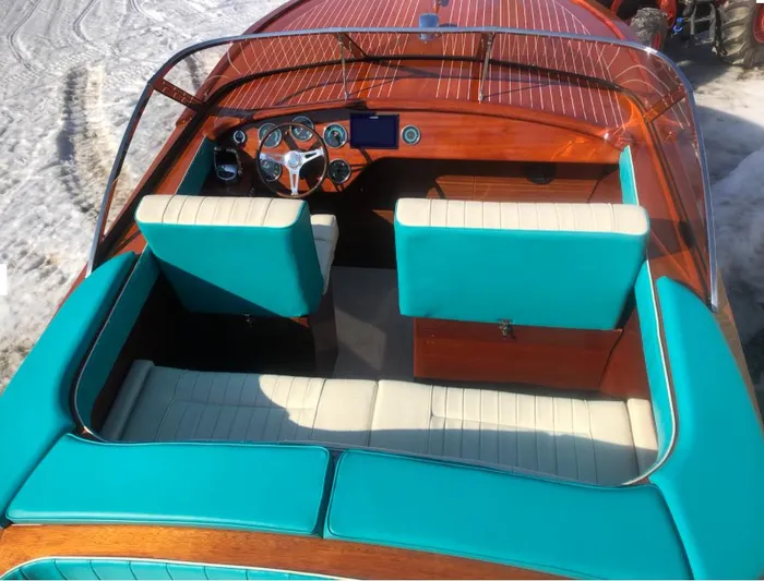 Arrivederci Yacht Photos Pics 2018 Riva Reets Replica Super Aquarama with turquoise and white interior, wooden dashboard.