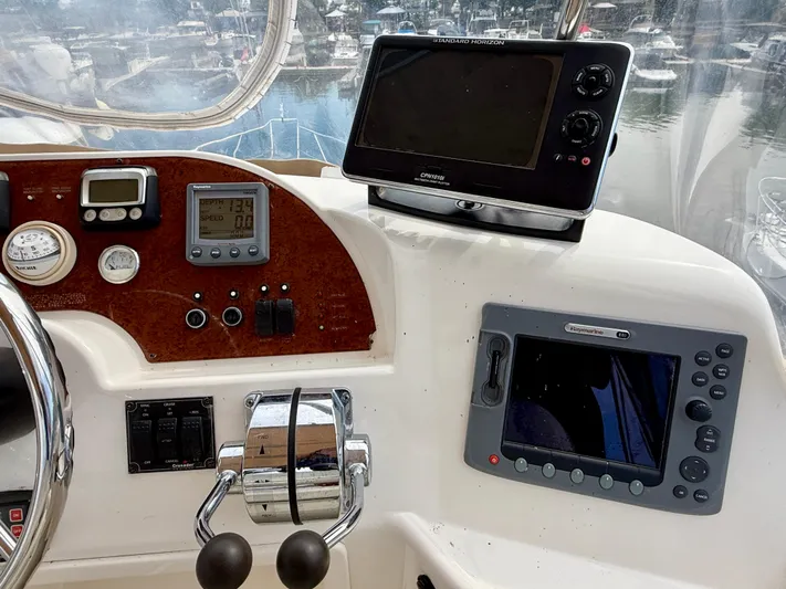  Yacht Photos Pics Control panel of a 2008 Silverton 33 Convertible boat with navigation instruments.