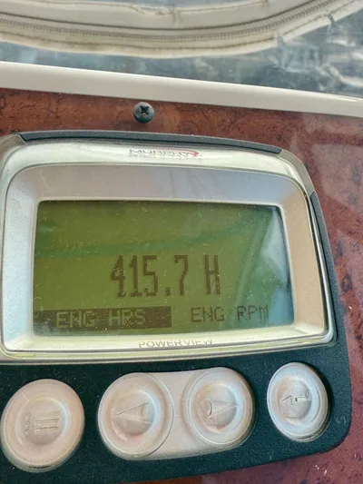  Yacht Photos Pics Engine hour meter displaying 415.7 hours on a 2008 Silverton 33 Convertible boat.