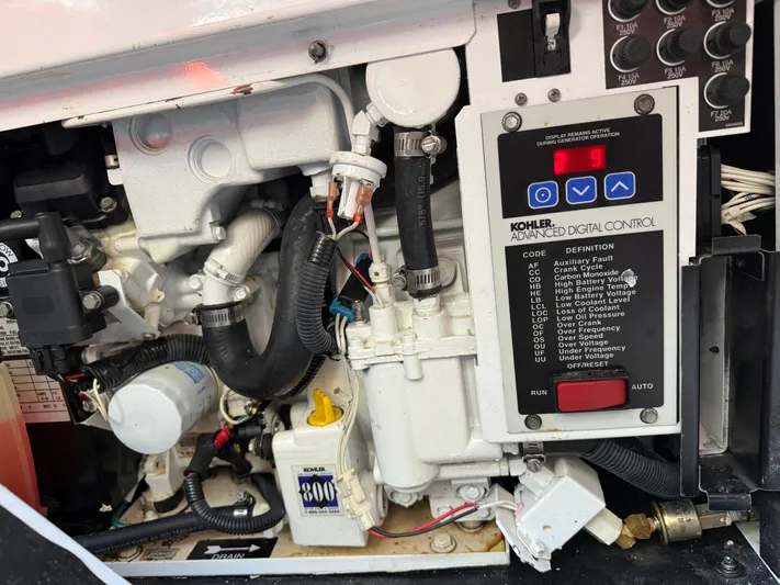  Yacht Photos Pics Engine compartment of a 2008 Silverton 33 Convertible with Kohler digital control panel.