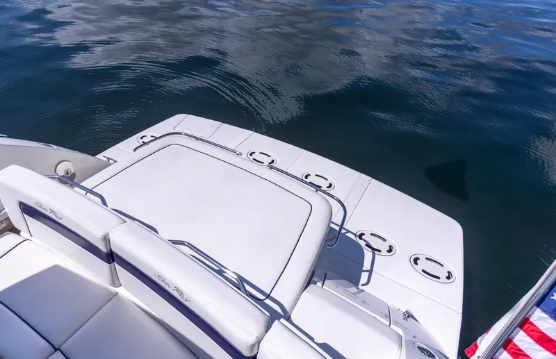  Yacht Photos Pics 2011 Sea Ray 450 Sundancer boat deck with seating, overlooking calm water.