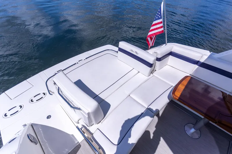  Yacht Photos Pics 2011 Sea Ray 450 Sundancer yacht deck with seating and American flag.