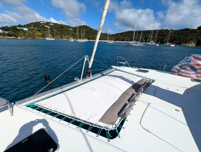 Seatitudes Yacht Photos Pics Fountaine Pajot Helia 44 Evolution catamaran anchored in scenic bay, 2017 model.
