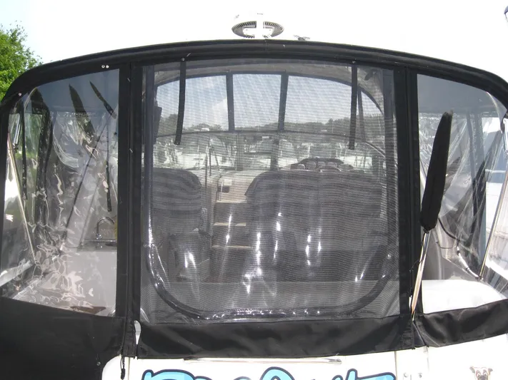  Yacht Photos Pics 2011 Sea Ray 350 Sundancer with rear enclosure and mesh screen.