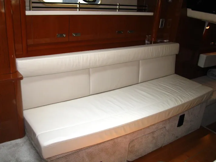  Yacht Photos Pics Luxurious white leather seating in 2011 Sea Ray 350 Sundancer yacht interior.