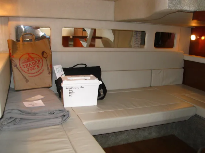  Yacht Photos Pics Interior of 2011 Sea Ray 350 Sundancer with seating and storage items.