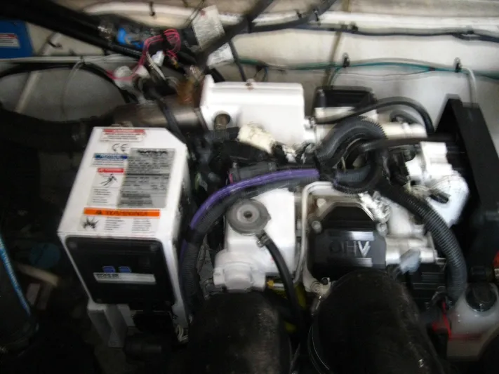  Yacht Photos Pics Engine compartment of a 2011 Sea Ray 350 Sundancer boat.