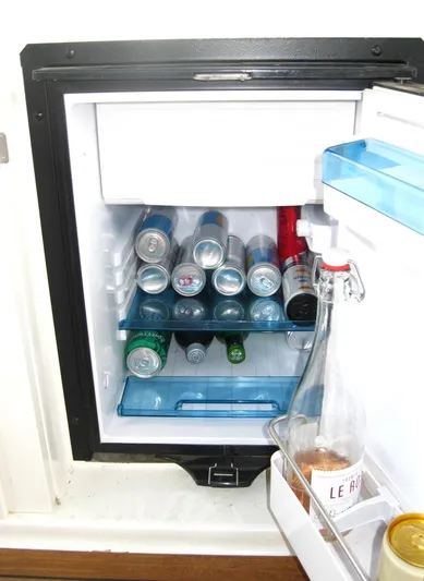  Yacht Photos Pics Mini fridge stocked with beverages on a 2011 Sea Ray 350 Sundancer boat.