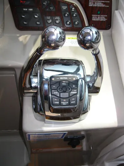  Yacht Photos Pics Chrome throttle controls on 2011 Sea Ray 350 Sundancer boat dashboard.