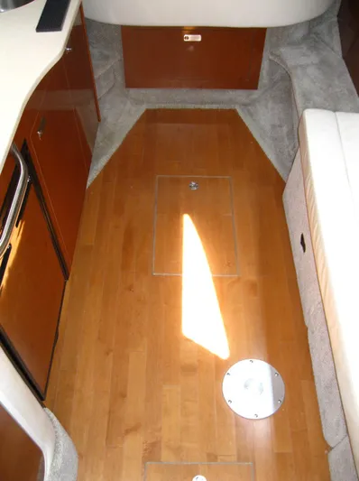  Yacht Photos Pics 2011 Sea Ray 350 Sundancer interior with wood flooring and cabinetry.