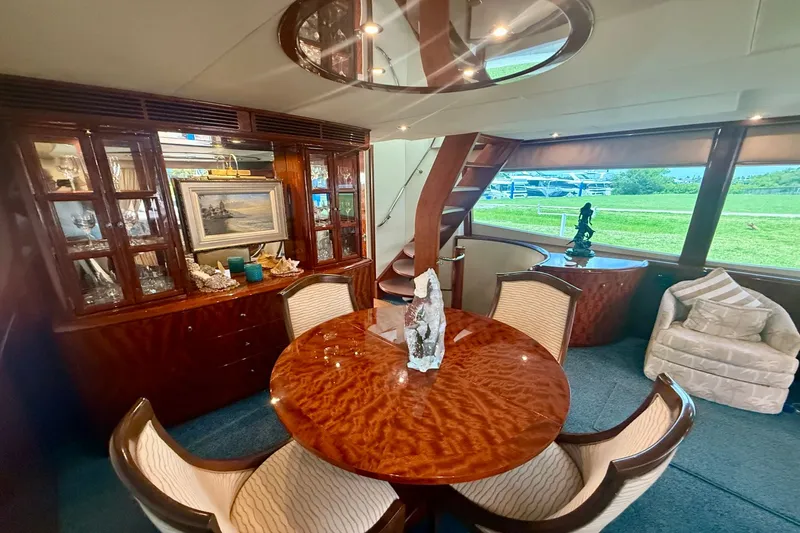 Marsha Sea Yacht Photos Pics Luxurious interior of 2005 Lazzara 68 Flybridge yacht with elegant dining area.
