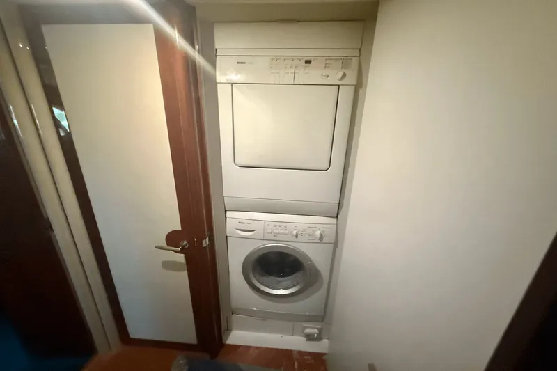 Marsha Sea Yacht Photos Pics Stacked washer and dryer inside 2005 Lazzara 68 Flybridge yacht.