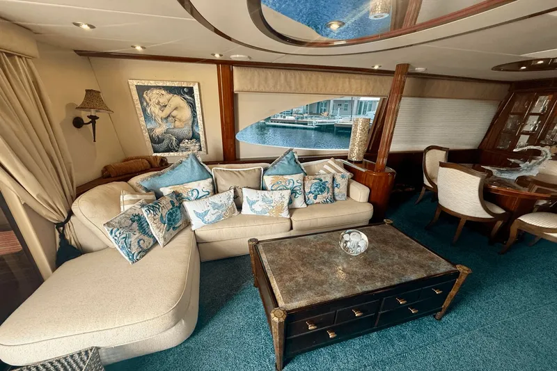 Marsha Sea Yacht Photos Pics Luxurious interior of 2005 Lazzara 68 Flybridge yacht with elegant seating and decor.