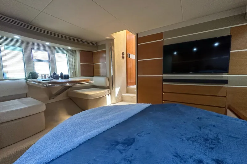  Yacht Photos Pics Luxurious interior of 2013 Azimut Fly 53 yacht with modern furnishings and large windows.