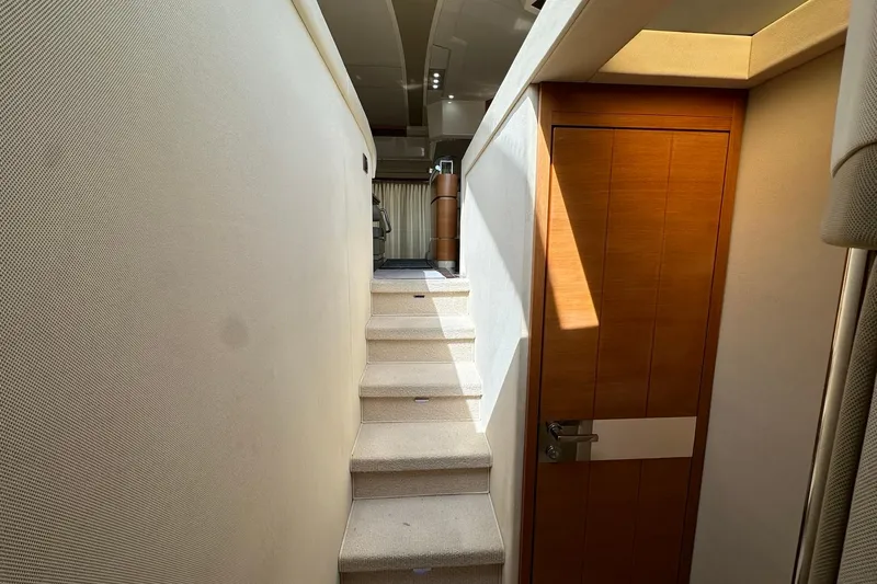  Yacht Photos Pics Interior stairs and door in 2013 Azimut Fly 53 yacht, featuring modern design.