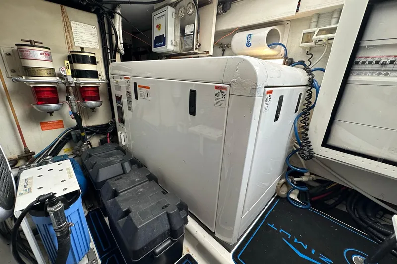  Yacht Photos Pics Engine room of 2013 Azimut Fly 53 yacht with equipment and control panels.