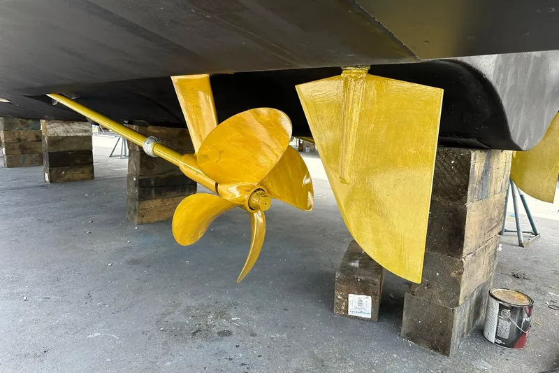  Yacht Photos Pics Yellow propeller and rudder of 2013 Azimut Fly 53 yacht on dry dock.