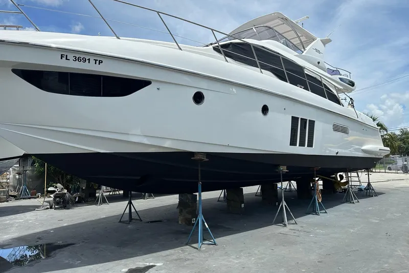  Yacht Photos Pics 2013 Azimut Fly 53 yacht on stands, side view, clear sky background.