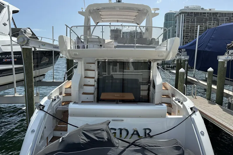  Yacht Photos Pics Luxury Azimut Fly 53 yacht docked at marina, showcasing elegant design and spacious deck.