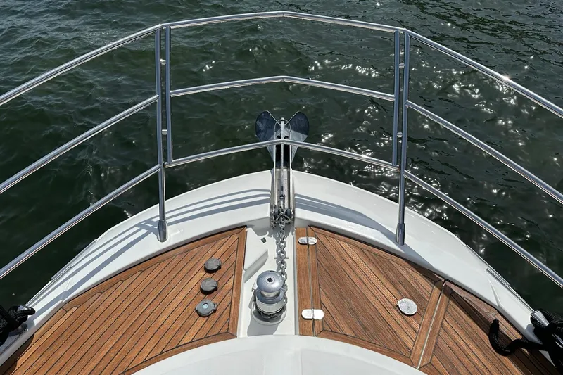  Yacht Photos Pics Bow of 2013 Azimut Fly 53 yacht with teak decking and stainless steel railings.