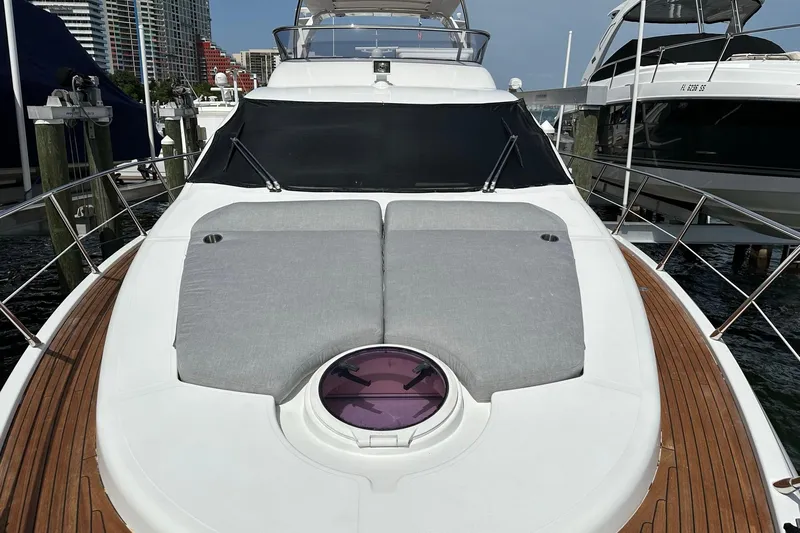  Yacht Photos Pics 2013 Azimut Fly 53 yacht with sunbathing area, docked at marina.