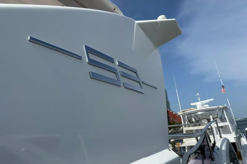  Yacht Photos Pics 2013 Azimut Fly 53 yacht with sleek design and chrome "53" emblem.