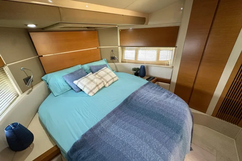  Yacht Photos Pics Luxurious bedroom interior of 2013 Azimut Fly 53 yacht with modern decor.