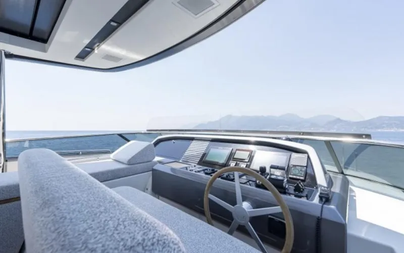  Yacht Photos Pics Helm of 2018 Sanlorenzo SL86 yacht with modern controls and ocean view.